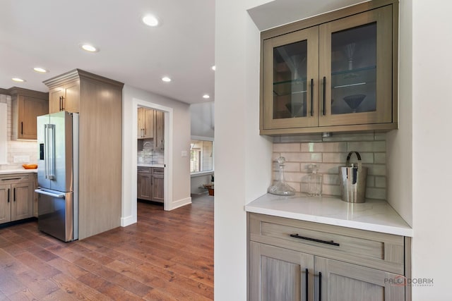 6517 Saddle Ridge Ct, Long Grove, IL 60047 - kitchen featuring high quality fridge, recessed lighting, decorative backsplash, dark wood finished floors, and glass insert cabinets