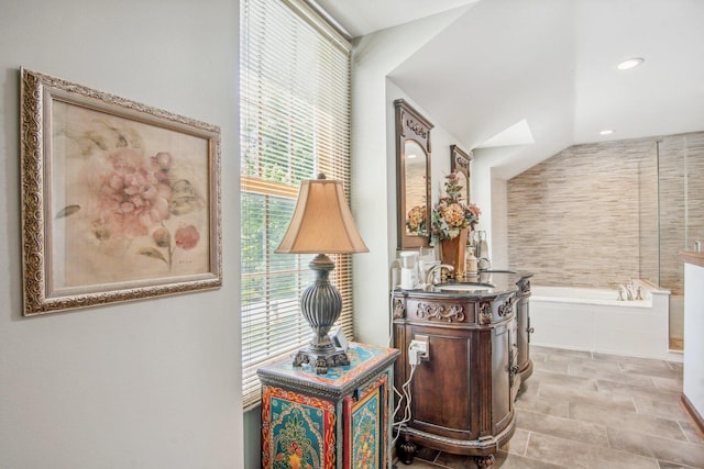5N647 Forest Glen Ln, Saint Charles, IL 60175 - hall featuring a skylight, a sink, stone finish floors, and recessed lighting