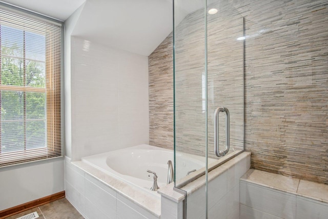 5N647 Forest Glen Ln, Saint Charles, IL 60175 - bathroom featuring vaulted ceiling, a garden tub, an enclosed shower, baseboards, and tile patterned flooring