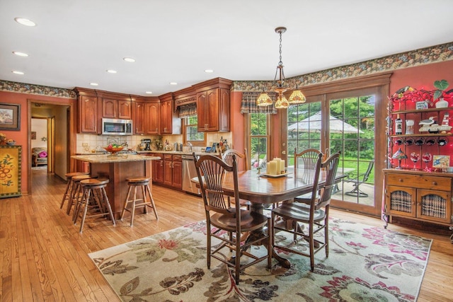 5N647 Forest Glen Ln, Saint Charles, IL 60175 - dining room featuring a chandelier, light wood-style flooring, and recessed lighting