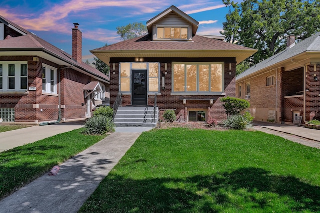 1724 W 105th St, Chicago, IL 60643 - bungalow-style home featuring a front lawn and brick siding