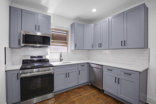1724 W 105th St, Chicago, IL 60643 - kitchen with appliances with stainless steel finishes, a sink, gray cabinetry, and recessed lighting