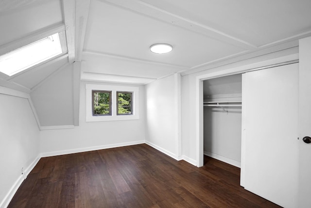 1724 W 105th St, Chicago, IL 60643 - unfurnished bedroom featuring wood finished floors, a closet, baseboards, a skylight, and vaulted ceiling