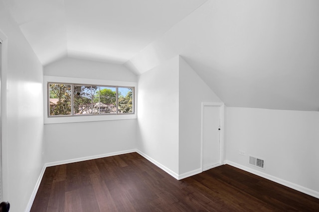 1724 W 105th St, Chicago, IL 60643 - additional living space with lofted ceiling, wood finished floors, and baseboards