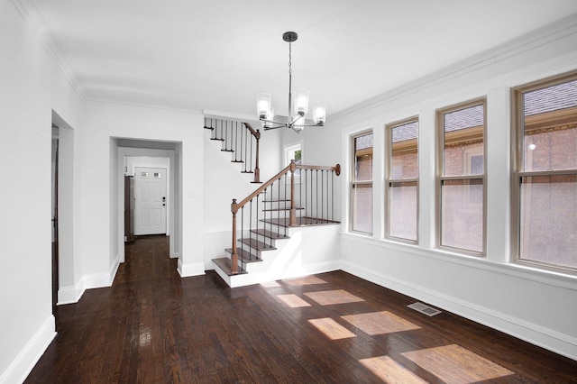 1724 W 105th St, Chicago, IL 60643 - foyer entrance featuring a chandelier, stairway, crown molding, wood finished floors, and baseboards