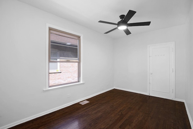 1724 W 105th St, Chicago, IL 60643 - spare room featuring wood finished floors, baseboards, and a ceiling fan