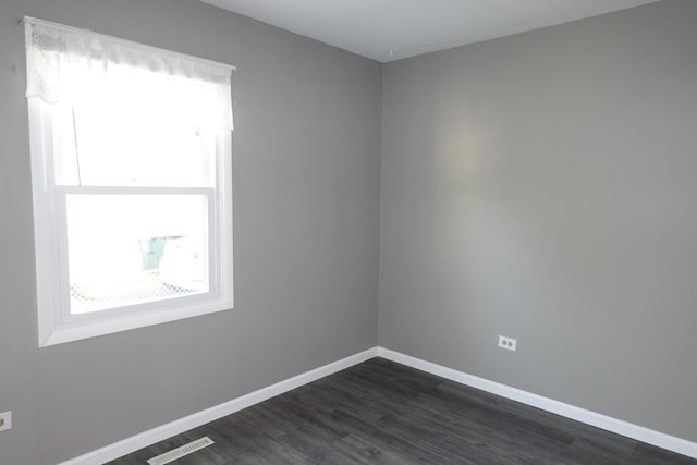 1330 Ridgeway Ave, Round Lake Beach, IL 60073 - unfurnished room featuring dark wood-type flooring and baseboards