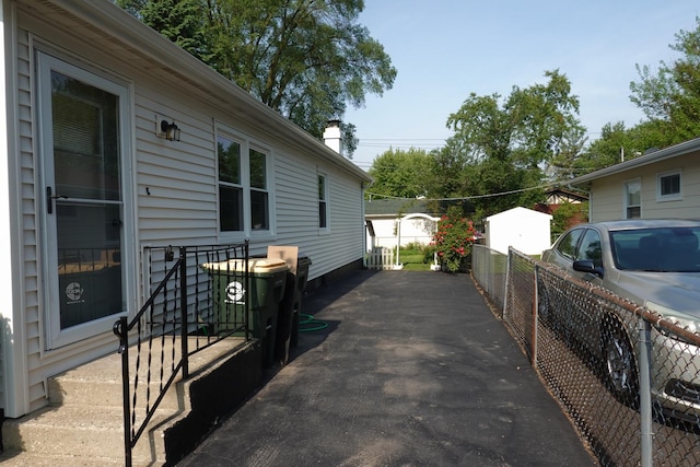 1330 Ridgeway Ave, Round Lake Beach, IL 60073 - view of patio / terrace featuring driveway