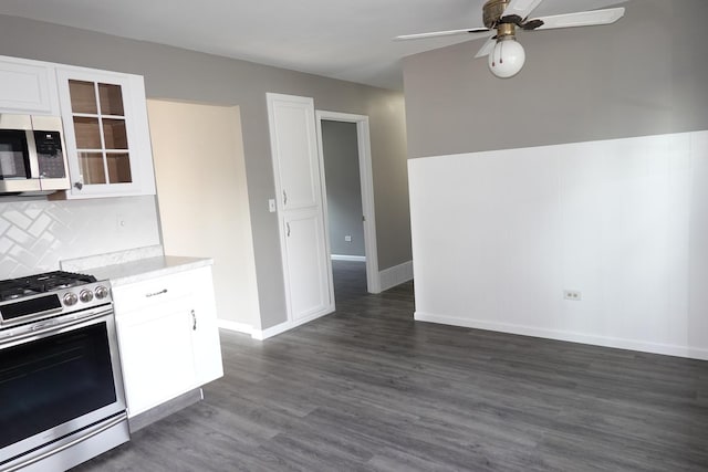 1330 Ridgeway Ave, Round Lake Beach, IL 60073 - kitchen featuring stainless steel appliances, ceiling fan, white cabinets, light countertops, and glass insert cabinets