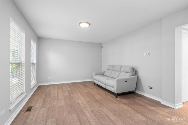 2724 Bluewater Cir, Naperville, IL 60564 - unfurnished room featuring light wood-style flooring and baseboards