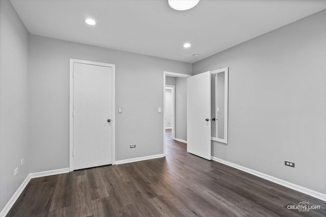 2724 Bluewater Cir, Naperville, IL 60564 - unfurnished bedroom featuring dark wood finished floors, recessed lighting, and baseboards