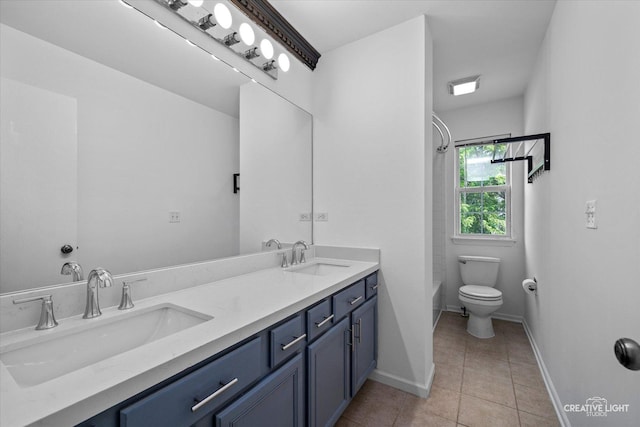 2724 Bluewater Cir, Naperville, IL 60564 - full bathroom with double vanity, tile patterned flooring, shower / bath combination, baseboards, and toilet