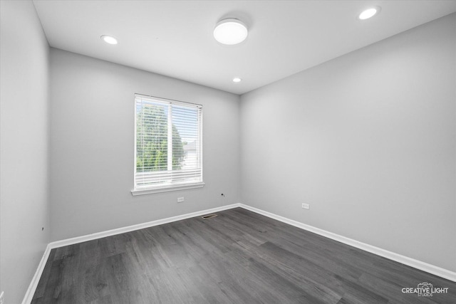 2724 Bluewater Cir, Naperville, IL 60564 - empty room featuring dark wood-type flooring, baseboards, and recessed lighting
