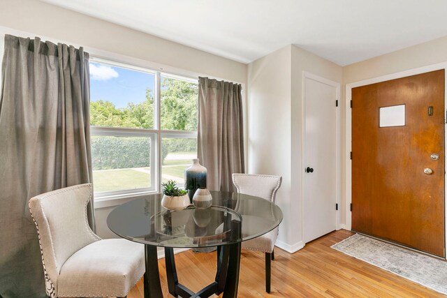1717 Dundee Rd, Northbrook, IL 60062 - dining area featuring light wood-style flooring and baseboards