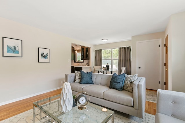 1717 Dundee Rd, Northbrook, IL 60062 - living area featuring light wood-style floors and baseboards