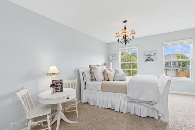 36932 N Fernview Ln, Lake Villa, IL 60046 - bedroom featuring a chandelier, baseboards, and carpet