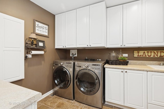 36932 N Fernview Ln, Lake Villa, IL 60046 - laundry area featuring cabinet space, separate washer and dryer, and baseboards