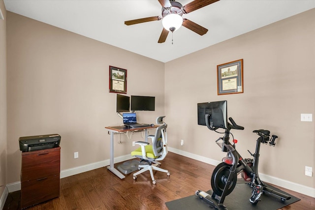 107 Bradford Ave, Savoy, IL 61874 - workout room featuring wood finished floors, ceiling fan, and baseboards