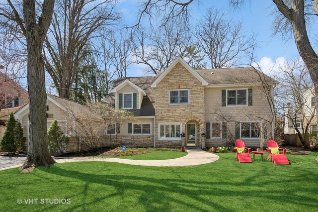 630 Juniper Rd, Glenview, IL 60025 - back of property with stone siding and a yard