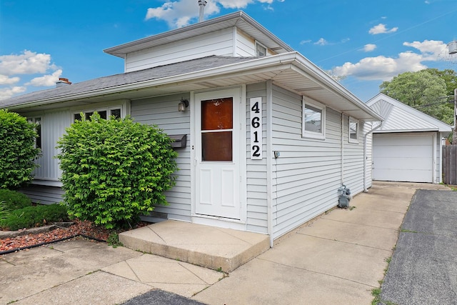 4612 W 89th Pl, Hometown, IL 60456 - view of front facade with an outdoor structure and a garage