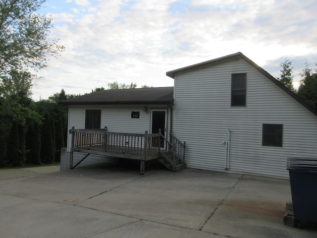 910 Stony Point Rd, Dixon, IL 61021 - back of property featuring a wooden deck and a patio area