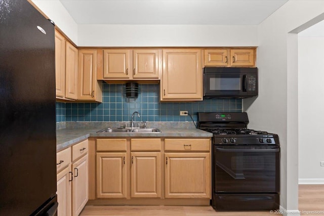 9745 S Karlov Ave Unit 608, Oak Lawn, IL 60453 - kitchen featuring black appliances, a sink, tasteful backsplash, and light brown cabinetry