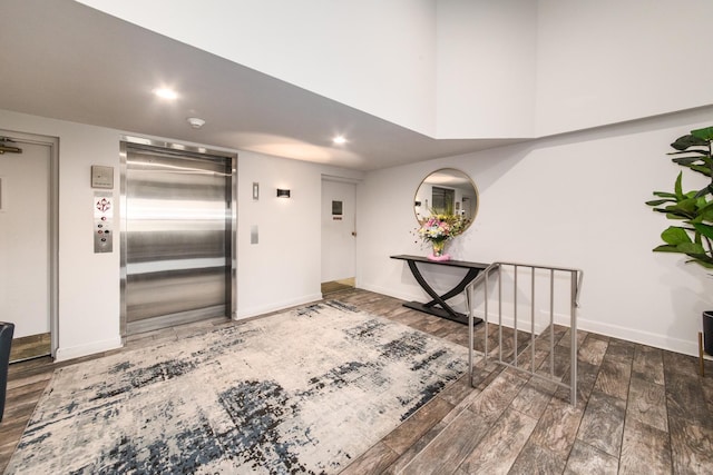 125 Boardwalk Pl Unit 101, Park Ridge, IL 60068 - entrance foyer featuring elevator, wood finished floors, baseboards, and recessed lighting