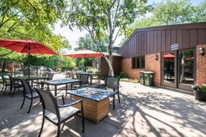 125 Boardwalk Pl Unit 101, Park Ridge, IL 60068 - view of patio / terrace with an outdoor fire pit