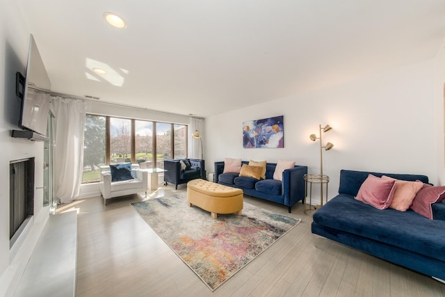 125 Boardwalk Pl Unit 101, Park Ridge, IL 60068 - living area featuring recessed lighting and wood finished floors