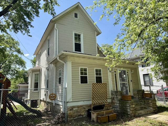 114 5th Ave, Joliet, IL 60433 - rear view of house with entry steps