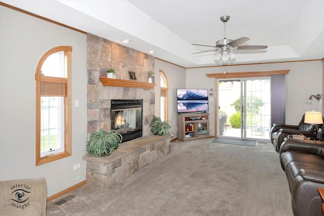 1360 Pheasant Chase Cir, Beecher, IL 60401 - living room with carpet floors, a tray ceiling, ceiling fan, and crown molding