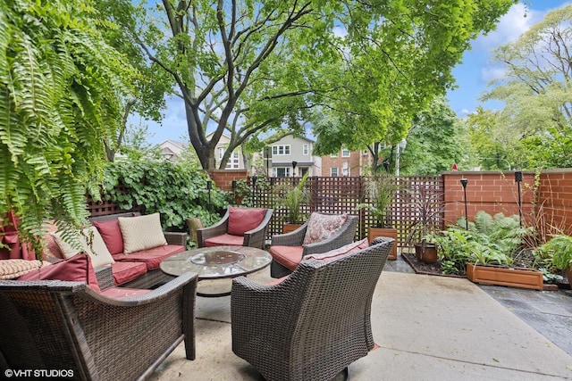5844 N Hermitage Ave Unit A, Chicago, IL 60660 - fenced backyard featuring outdoor lounge area and a patio