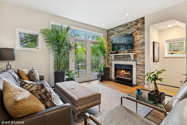 5844 N Hermitage Ave Unit A, Chicago, IL 60660 - living area with wood finished floors, a fireplace, and recessed lighting
