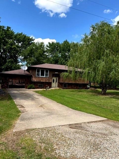 29478 E County Road 2390th Rd, Manito, IL 61546 - raised ranch featuring concrete driveway and a front lawn