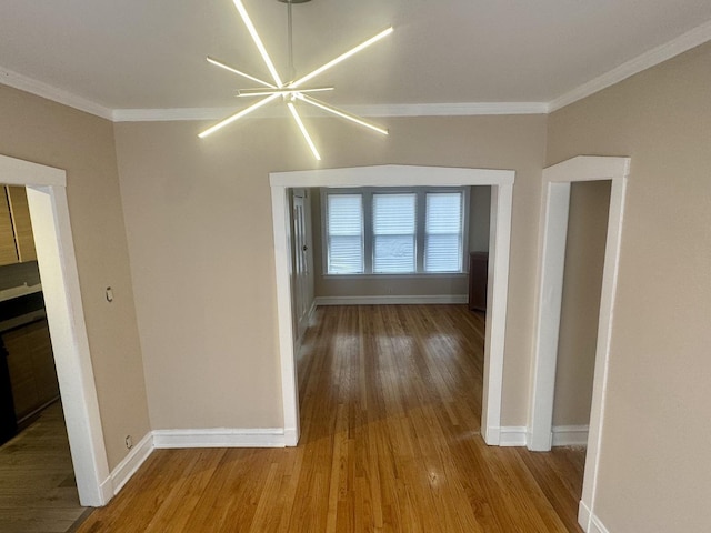 6638 S Greenwood Ave Unit 2B, Chicago, IL 60637 - hallway with wood finished floors, baseboards, and crown molding