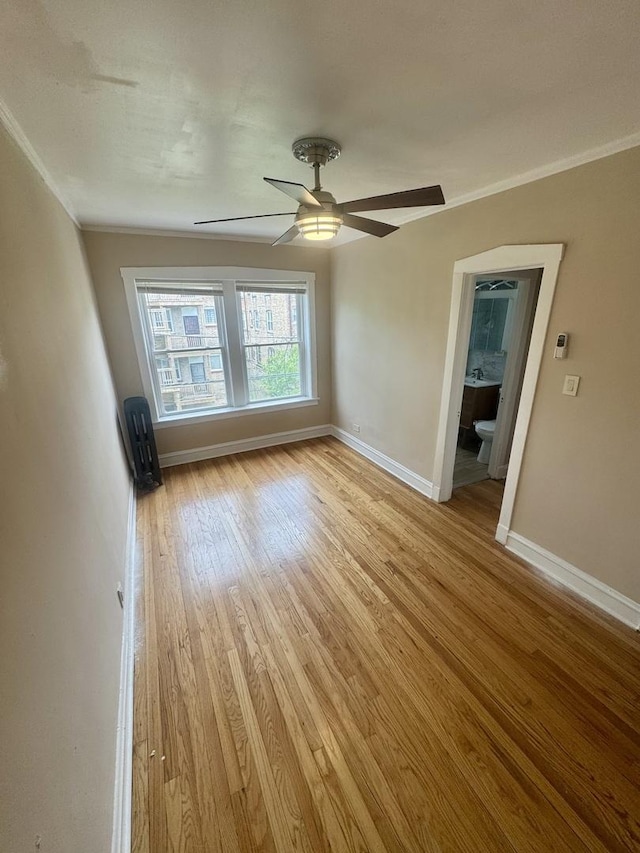 6638 S Greenwood Ave Unit 2B, Chicago, IL 60637 - empty room with ceiling fan, light wood-type flooring, ornamental molding, and baseboards