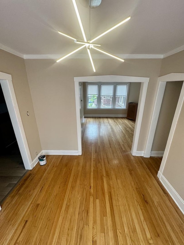 6638 S Greenwood Ave Unit 2B, Chicago, IL 60637 - empty room with baseboards, light wood-style floors, and ornamental molding