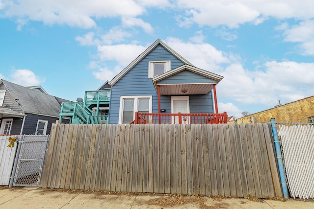 1418 S Cicero Ave, Cicero, IL 60804 - view of front facade featuring a fenced front yard and a gate