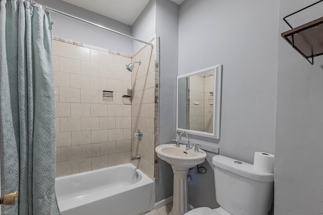 1418 S Cicero Ave, Cicero, IL 60804 - bathroom with shower / bath combo, toilet, and a sink