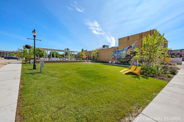 14 S Prospect St Unit 211, Roselle, IL 60172 - view of community with a yard