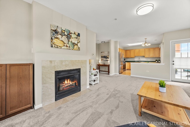 14 S Prospect St Unit 211, Roselle, IL 60172 - living room with light colored carpet, a tiled fireplace, and baseboards