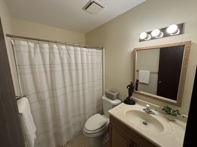 59 Vail Colony St Unit 3, Fox Lake, IL 60020 - bathroom with vanity, toilet, and curtained shower