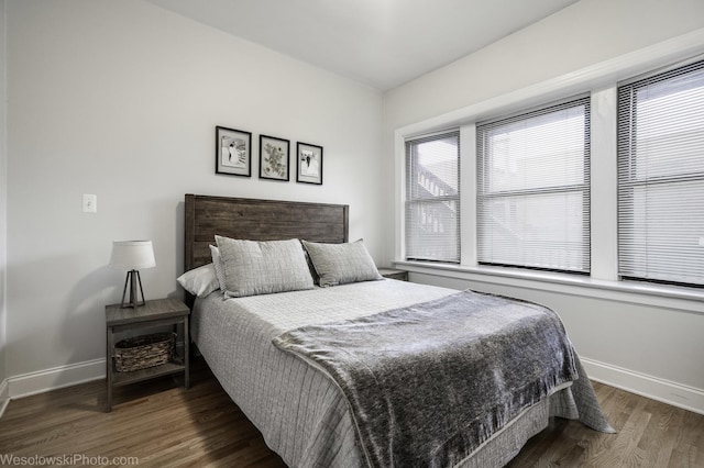 4005 N Southport Ave Unit 2, Chicago, IL 60613 - bedroom featuring baseboards and wood finished floors