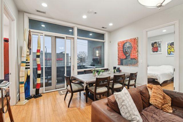 2424 W Chicago Ave Unit 202, Chicago, IL 60622 - dining space with hardwood / wood-style floors, recessed lighting, and floor to ceiling windows