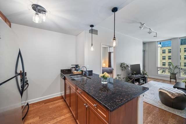 1400 S Michigan Ave Unit 707, Chicago, IL 60605 - kitchen with a sink, stainless steel appliances, a peninsula, rail lighting, and open floor plan