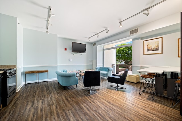 1400 S Michigan Ave Unit 707, Chicago, IL 60605 - living area with track lighting, wood finished floors, and baseboards