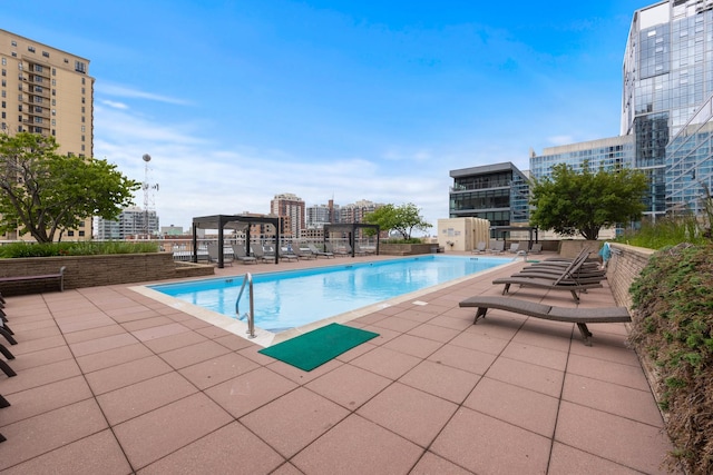 1400 S Michigan Ave Unit 707, Chicago, IL 60605 - community pool featuring a pergola, a patio, and a city view
