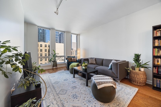 1400 S Michigan Ave Unit 707, Chicago, IL 60605 - living area with wood finished floors and track lighting
