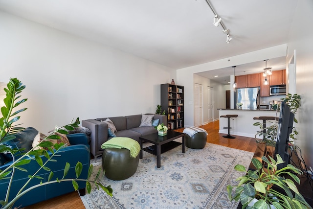 1400 S Michigan Ave Unit 707, Chicago, IL 60605 - living area featuring wood finished floors and track lighting