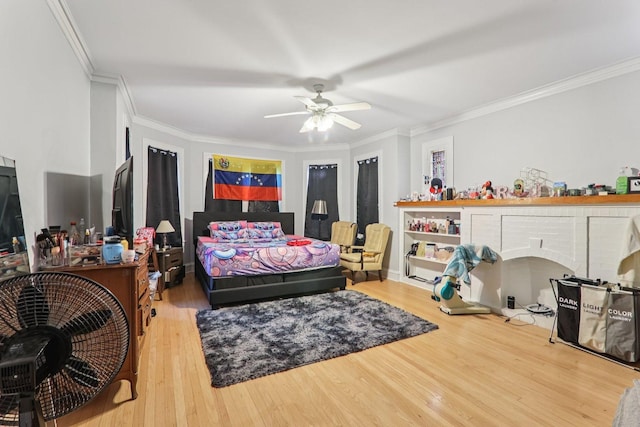 2115 W Arthur Ave, Chicago, IL 60645 - bedroom featuring crown molding, wood finished floors, and ceiling fan
